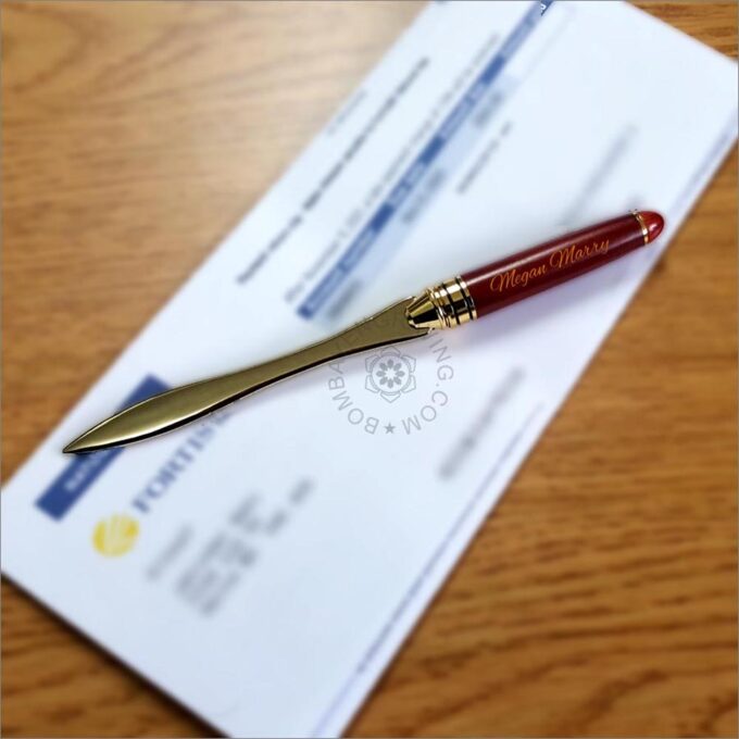 Wooden handle letter opener in gold