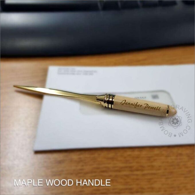 Metal letter opener with wooden handle